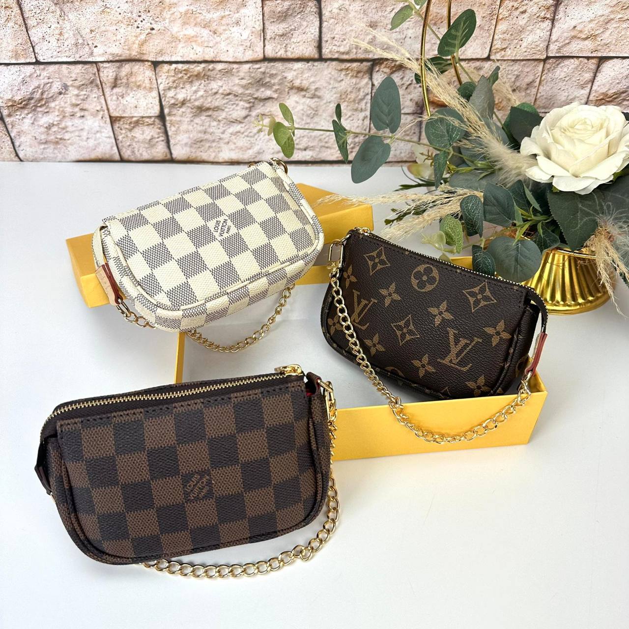 Louis Vuitton Pochette Accessoires Mini Pouch Vivienne Mascot genuine leather women's bag